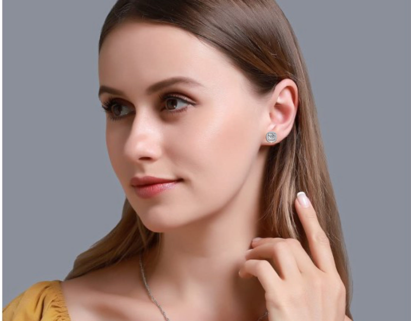 Oval Solitaire Studs with Halo.
