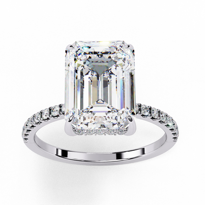 Solitaire Emerald with side diamond