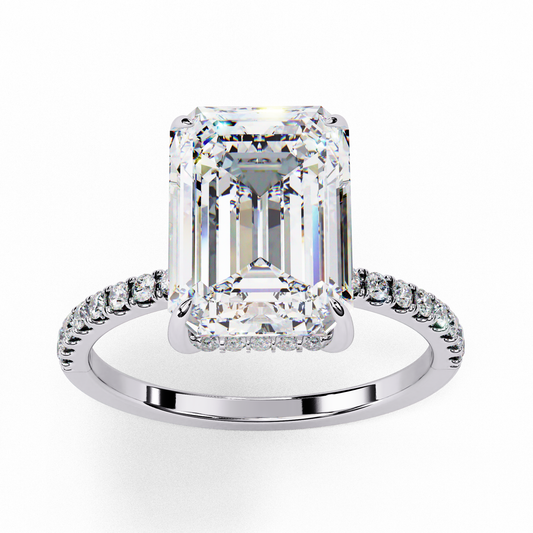 Solitaire Emerald with side diamond